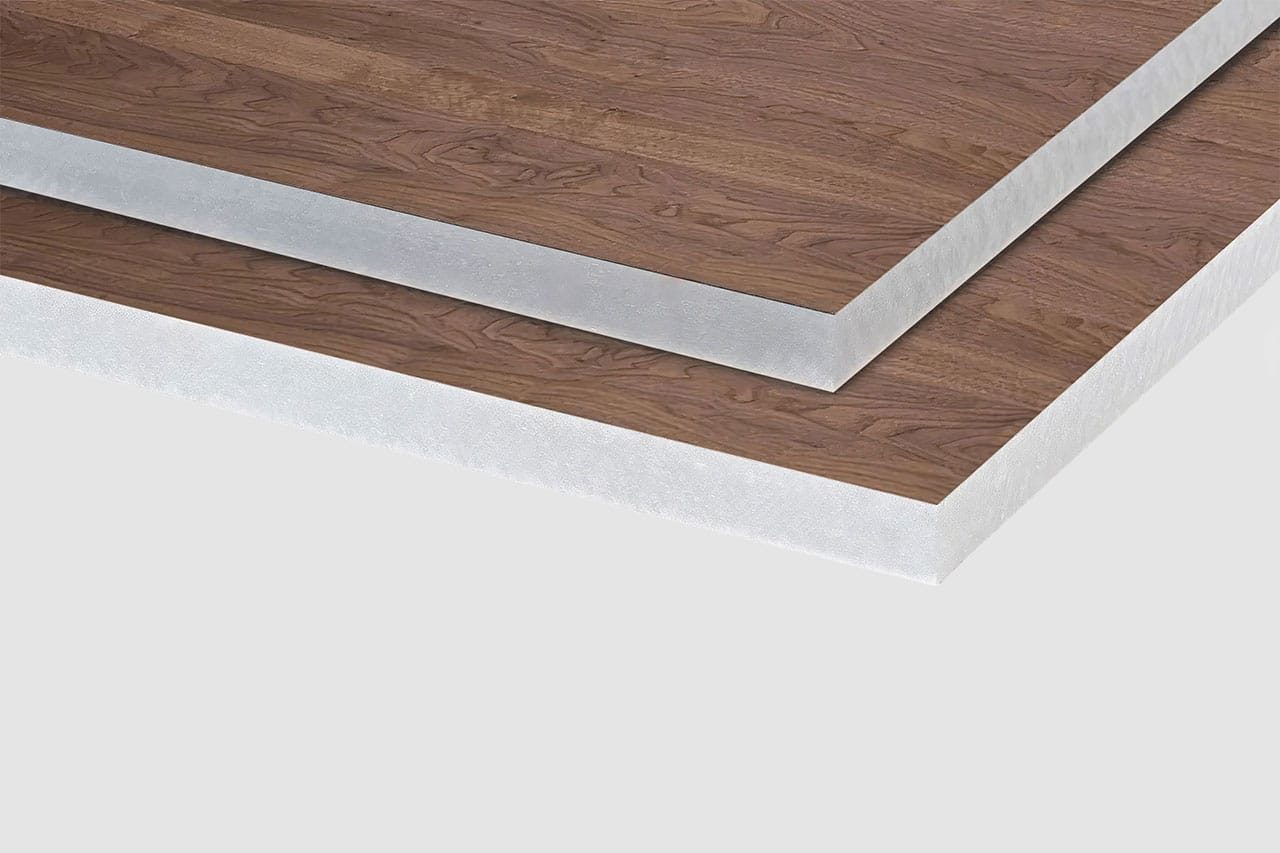 Two rectangular panels from our Polyester Acoustic Panels Offerings feature a wood-grain finish on top and white, textured edges, stacked slightly offset against a plain, light background.